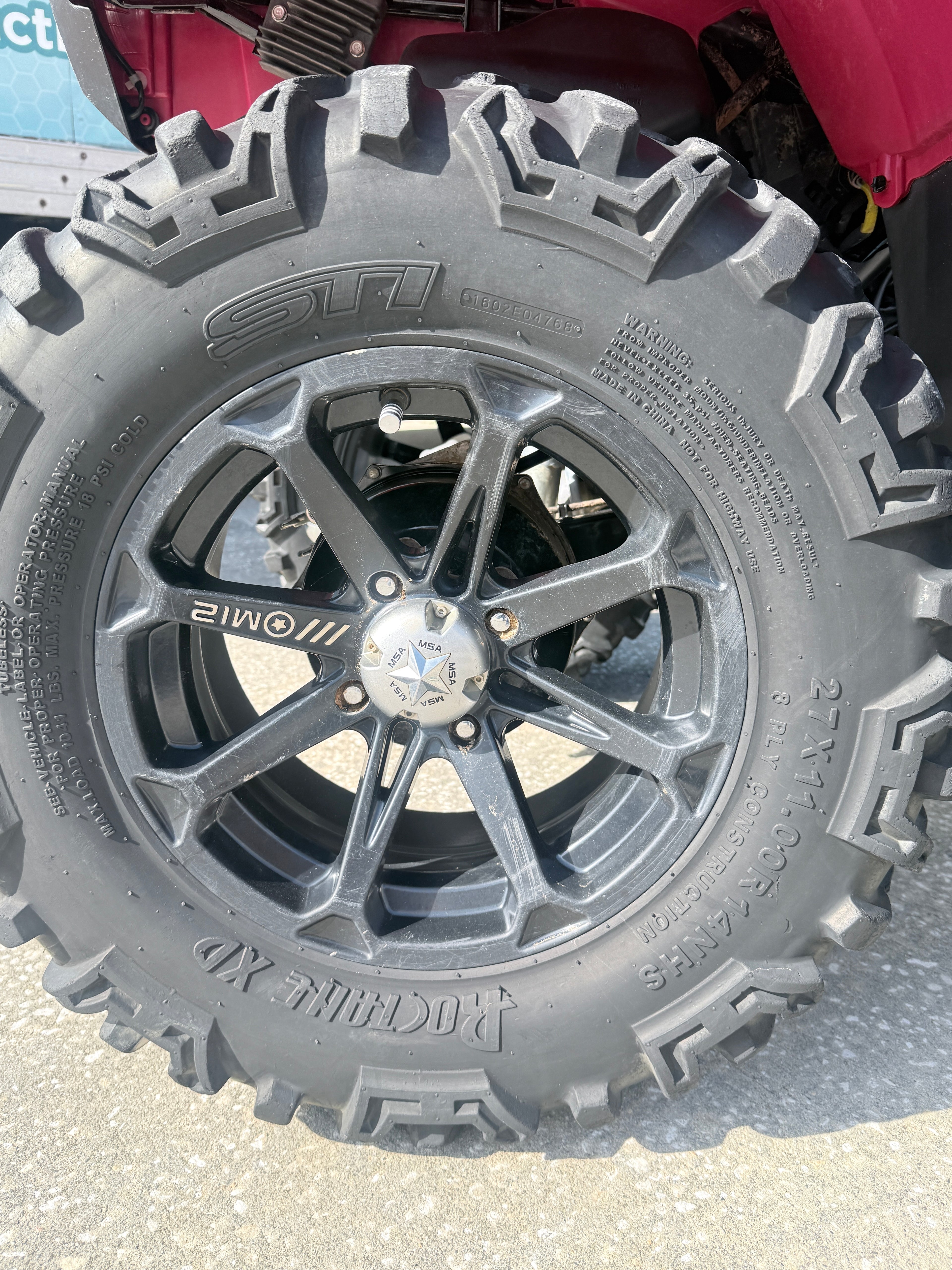 Honda FourTrax Foreman 4x4 25x10-12 rear tire detail