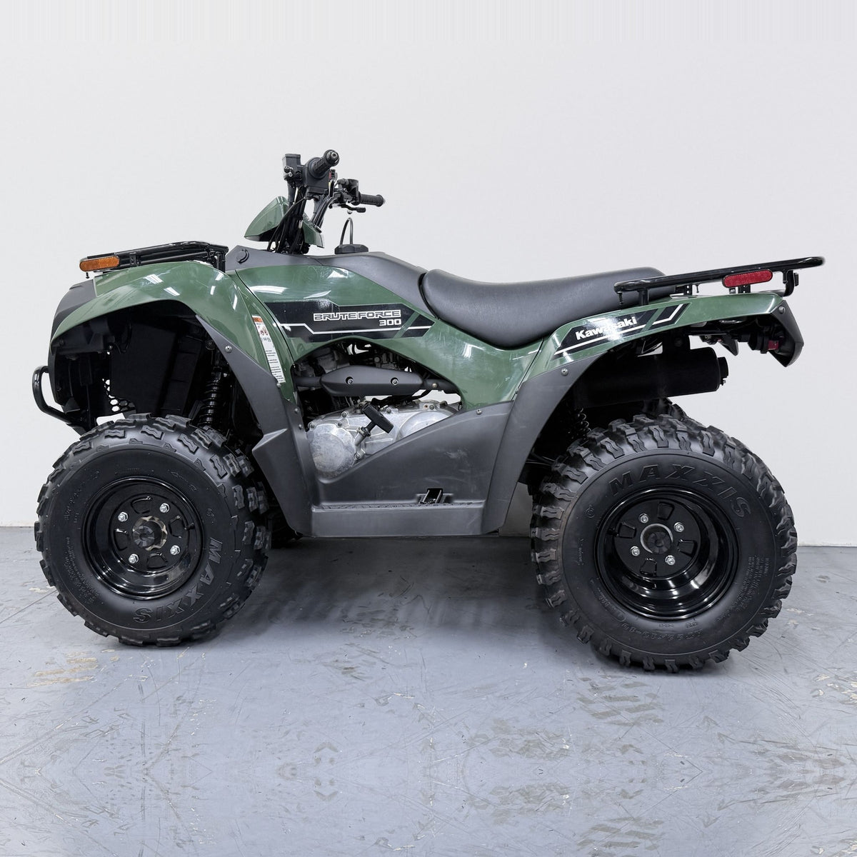 2025 Kawasaki Brute Force 300 – Pre-Owned ATV - Green - side view